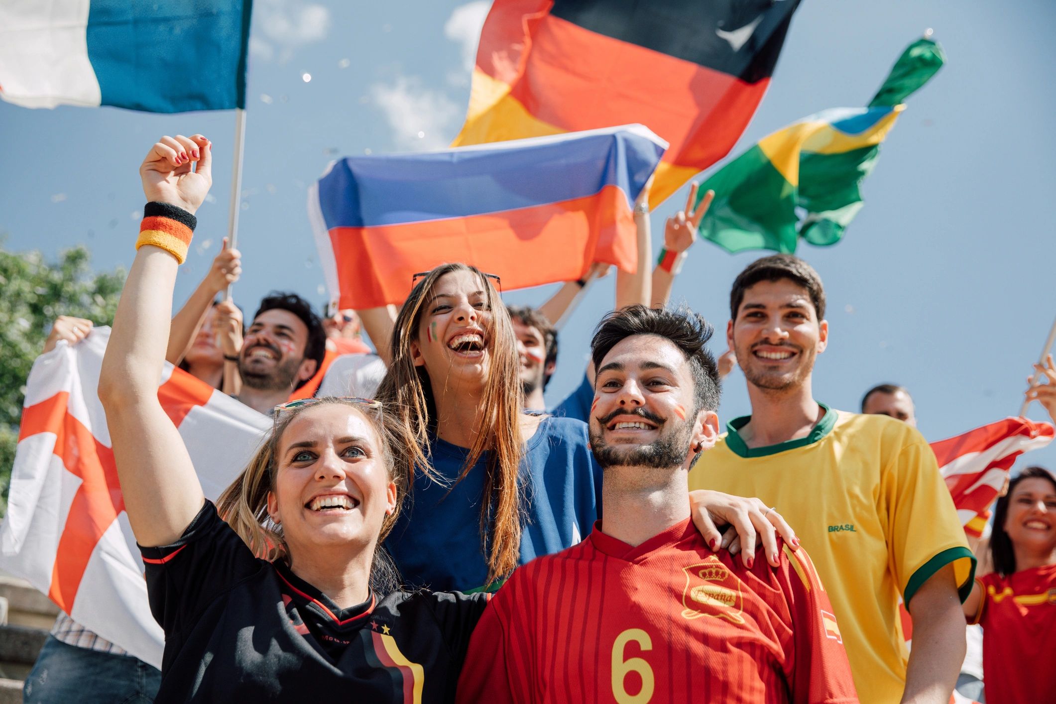International sports fans celebrating together